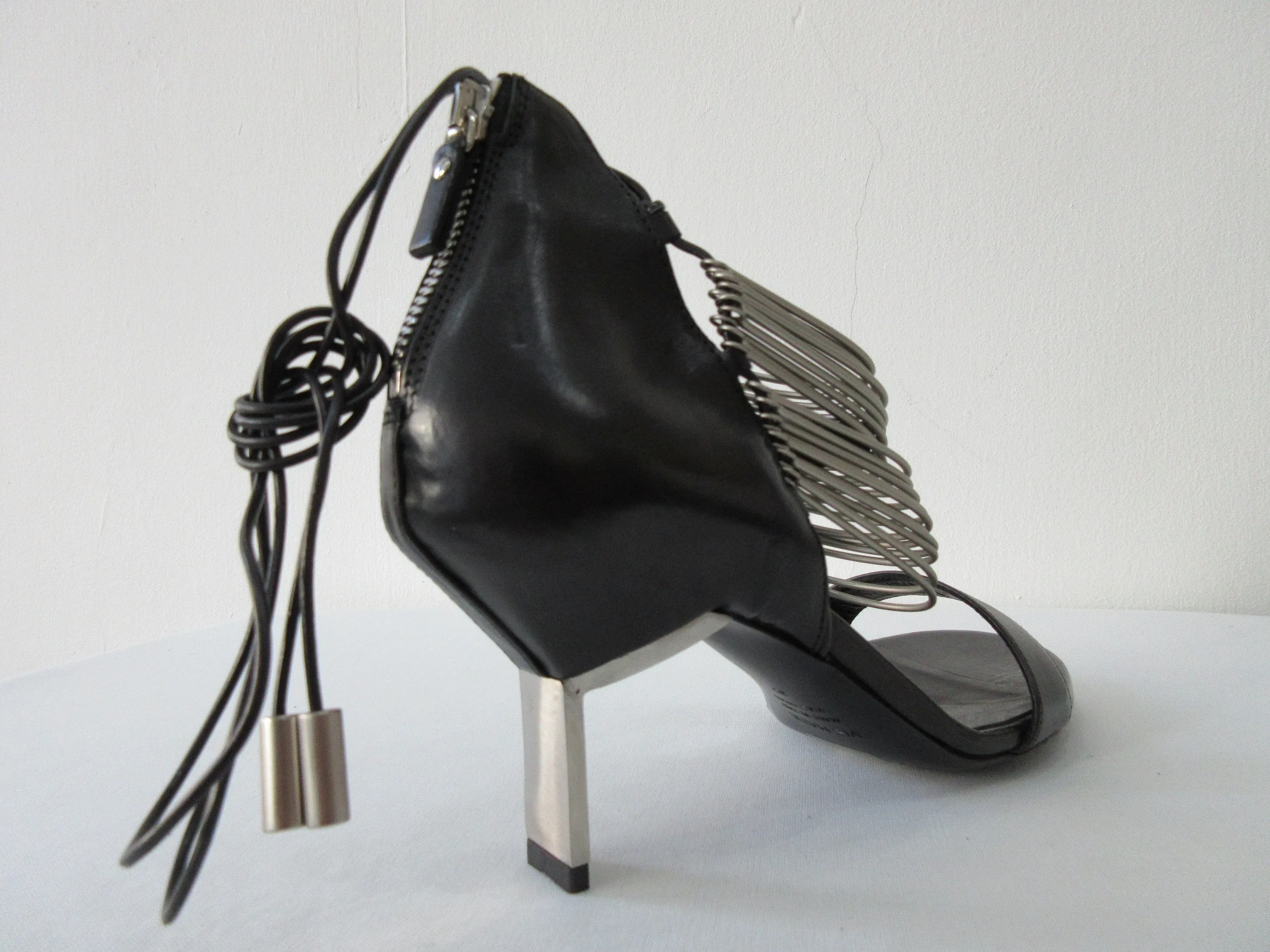 20S08B -Vic Matie Black Curved Metal Heels